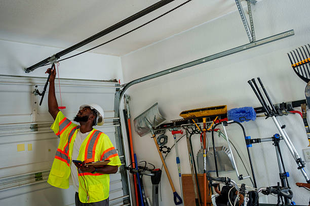 Professional Garage Door Panel Replacement technician working in Huntsville, AR